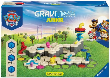 Text: "Nickelodeon Paw Patrol", "GraviTrax Junior", "3-7 years", "172 pc", "Starter-Set". Box mit Spielzeug und Paw Patrol Figuren.