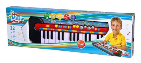Kinder-Keyboard-Verpackung mit "My Music World"-Logo, 32 Tasten und Bild eines lächelnden Jungen, der Keyboard spielt.