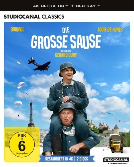 Oben steht „4K ULTRA HD™ + BLU-RAY™“. Zwei Männer in Uniformen, einer trägt den anderen Huckepack, mit Flugzeugen im Hintergrund.