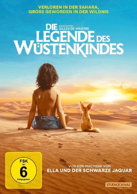 "Verloren in der Sahara, Groß geworden in der Wildnis. Die Legende des Wüstenkindes. FSK ab 6 freigegeben." Junge im Sand mit Fuchs.