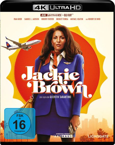 „Jackie Brown“, ein Film von Quentin Tarantino. Frau in blauer Uniform, Flugzeug, roter Kreis, Altersfreigabe „FSK ab 16“.