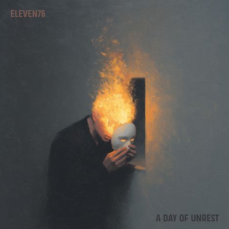 Oben links: "ELEVEN76", unten rechts: "A DAY OF UNREST". Ein Mann hält eine Maske, sein Kopf ist in Flammen.