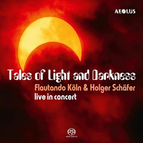 "Tales of Light and Darkness", Flautando Köln & Holger Schäfer live im Konzert. Sonnenfinsternis mit rotem Himmel im Hintergrund.