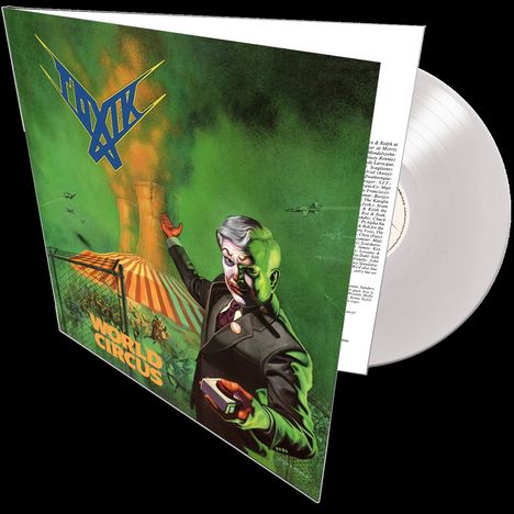 „World Circus“ in gelber Schrift. Ein clownartig geschminkter Mann zeigt auf einen Zirkus und einen Atomreaktor.