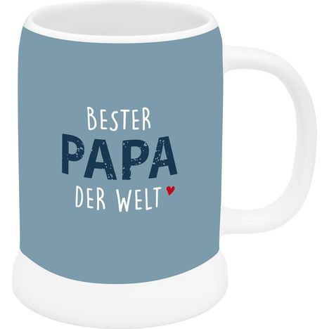 Auf einem blauen Hintergrund steht: "Bester Papa der Welt" mit kleinem roten Herz. Tasse mit Henkel.