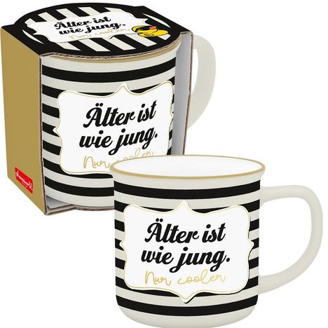 Schwarz-weiß gestreifte Tasse mit dem Text: "Älter ist wie jung. Nur cooler." in schwarzer und goldener Schrift.