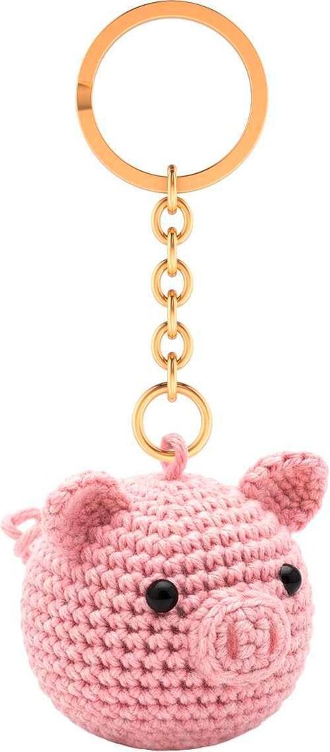Schlüsselanhänger mit gehäkeltem, rosa Schwein; goldener Ring und Gliederkette.