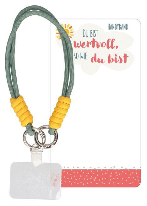 "DU BIST wertvoll, SO WIE du bist" steht in einer Karte. Darunter ein Handyband mit grünen Schnüren und gelben Knoten.