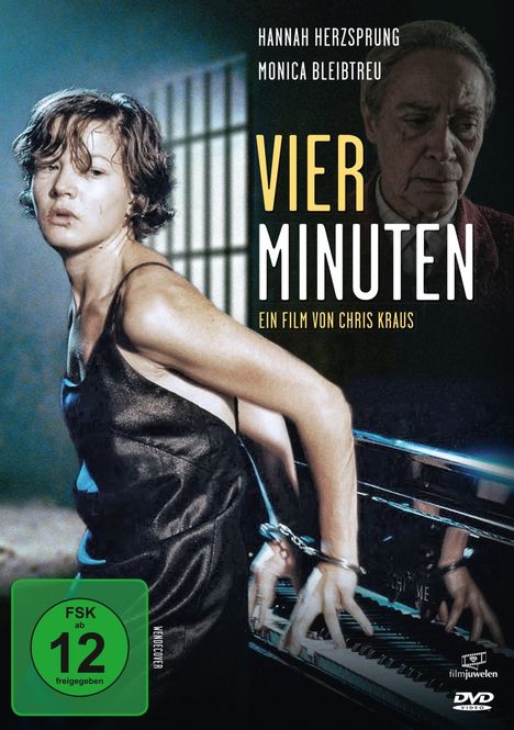"Vier Minuten" mit Hannah Herzsprung, Monica Bleibtreu. Eine junge Frau in Handschellen spielt Klavier, gefolgt von einem älteren Mann.