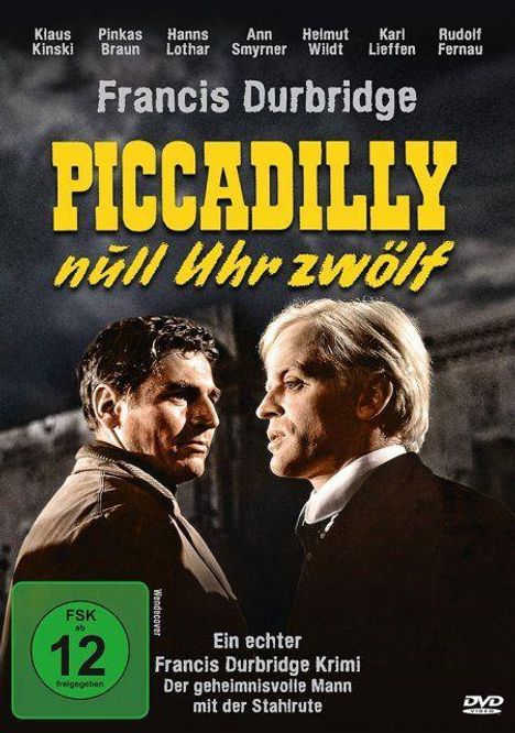 Titel: Piccadilly, null Uhr zwölf. Bild von zwei Männern in einem dunklen Umfeld. FSK 12 Logo am linken unteren Rand.