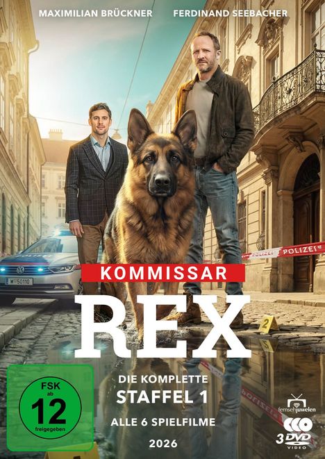 „MAXIMILIAN BRÜCKNER, FERDINAND SEEBACHER, KOMMISSAR REX, STAFFEL 1, FSK 12“ Ein Hund, zwei Männer, Polizeiauto.