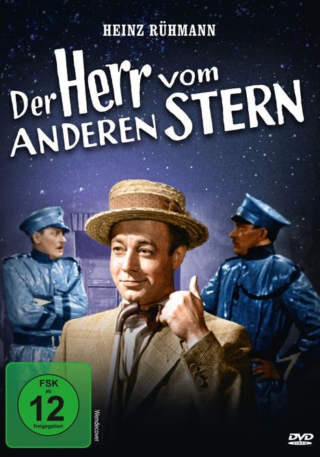 "Der Herr vom anderen Stern", FSK ab 12. Ein Mann mit Strohhut, umgeben von zwei Personen in blauen Uniformen. 