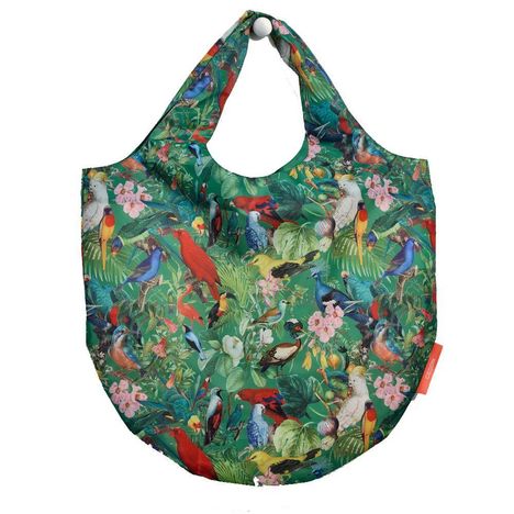 Bunte Tasche mit Papageien- und Blumenmuster. Lebendige Vögel auf grünem Hintergrund.