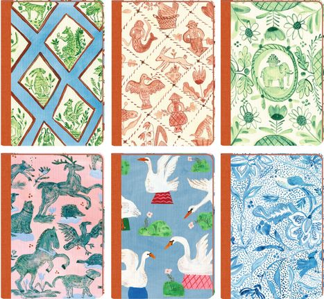 Ein Set von Notizheften mit verschiedenen Tier- und Naturmustern in lebhaften Farben und orangefarbenem Rücken.