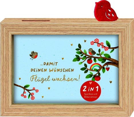 „…DAMIT DEINEN WÜNSCHEN Flügel wachsen!“ und „2 IN 1 Spardose und Bilderrahmen“. Illustration mit Vögeln und Bäumen.
