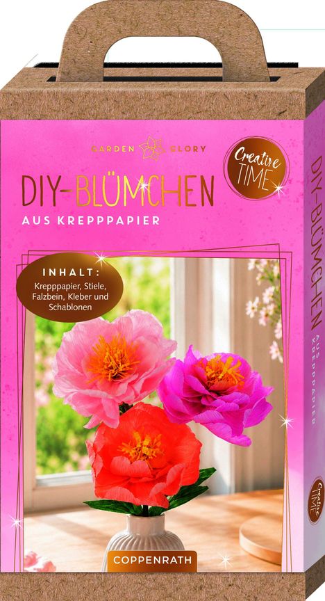 Text: "DIY-Blümchen aus Krepppapier. Inhalt: Krepppapier, Stiele, Falzbein, Kleber und Schablonen." 

Verpackung mit bunten Blumen.