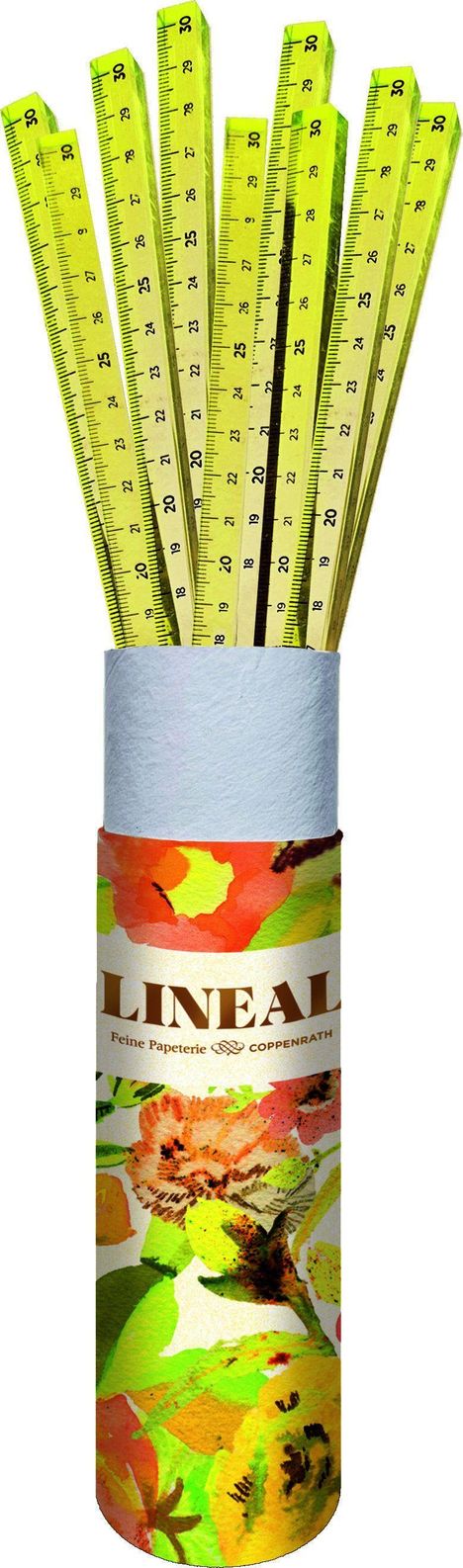 "LINEAL Feine Papeterie" auf einer farbenfrohen Verpackung. Darin stecken mehrere gelbe Lineale bis 30 cm.