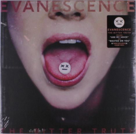 "EVANESCENCE" und "THE BITTER TRUTH". Offener Mund mit geschminkten Lippen, Zunge zeigt Tablette mit Gesicht.