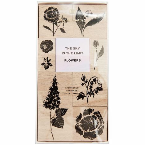 "The sky is the limit. Flowers. Stempelset. Stamp set. Lot de tampons." Verschiedene Blumenstempel auf Holzblöcken.