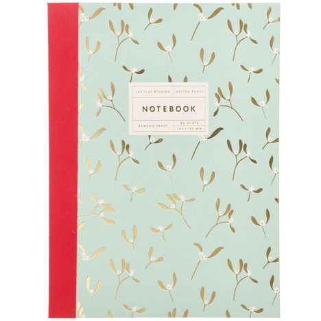 „Notebook, Lay Flat Binding, Dotted Pages, 80 pages...” sind die prominentesten Texte. Das Design ist floral auf mintgrünem Hintergrund mit einem roten Rücken.