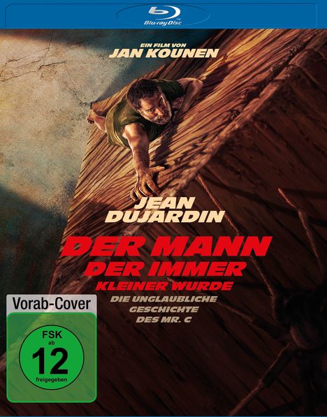 Blu-ray-Cover: Ein Mann klettert eine Wand hoch, eine riesige Spinne im Hintergrund. FSK 12, Hauptdarsteller Jean Dujardin.