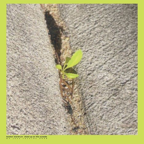 Text unten links: "booker stardrum close-up on the outside we jazz records 2026". 

Grüner Setzling wächst in einer Felsspalte.