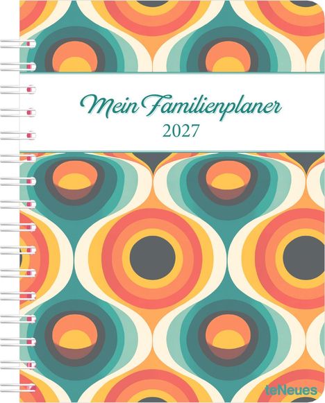 "Mein Familienplaner 2027" steht auf einem Notizbuch mit buntem Retro-Muster aus Kreisen und Wellen.