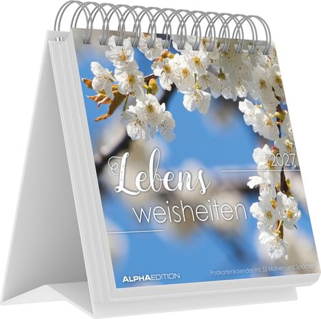 „Lebensweisheiten 2027“ steht auf einem Tischkalender mit Kirschblüten vor blauem Himmel.