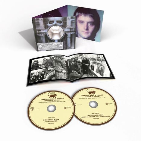 CD-Hüllen mit "Emerson, Lake & Palmer - Brain Salad Surgery" und zwei CDs, ein Bildband zeigt schwarz-weiße Fotos.