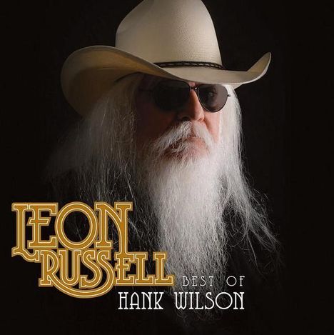 Text: "Leon Russell Best of Hank Wilson". Person mit weißem Bart, Sonnenbrille und Cowboyhut auf schwarzem Hintergrund.