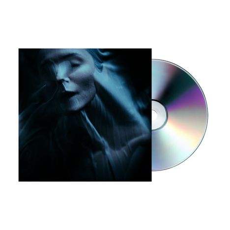Keine Texte sichtbar. Ein Albumcover zeigt ein blaulich beleuchtetes Gesicht und eine danebenliegende CD.