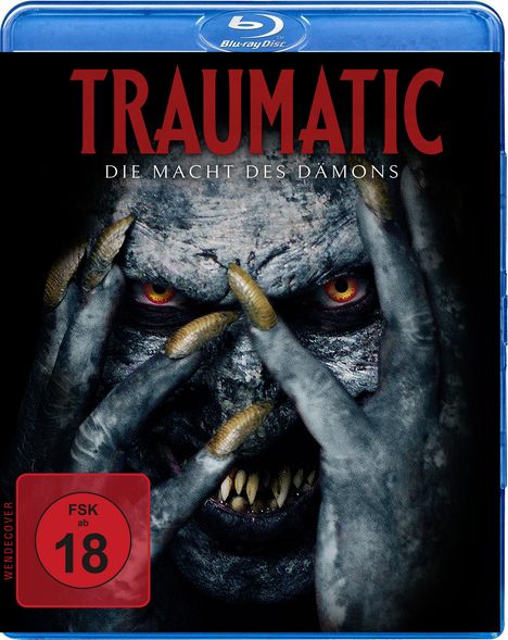 "TRAUMATIC: DIE MACHT DES DÄMONS" in roter Schrift, dämonisches Gesicht mit gelben Augen und Krallen, FSK 18-Symbol.