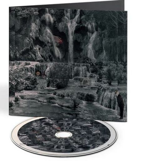 Text: "Cracker Island". Eine CD-Hülle zeigt eine mystische Landschaft mit Wasserfällen und einem Teich.