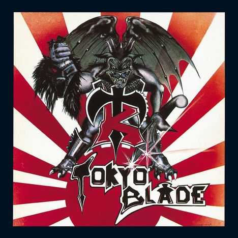 Text: "Tokyo Blade". Illustration: Dämon mit Flügeln, rotes und weißes Strahlenmuster im Hintergrund.