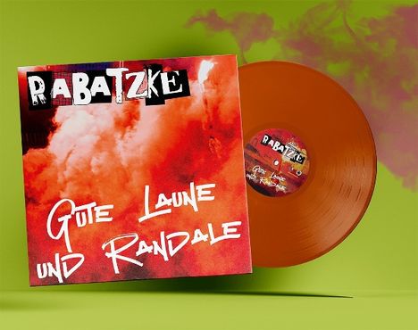 Text: "RABATZKE", "Gute Laune und Randale". Illustration eines roten Plattencovers neben einer orangen Vinyl-Schallplatte.