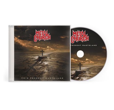"METAL CHURCH" und "THIS PRESENT WASTELAND". Eine verlassene Landschaft mit einem Kreuz auf einem Hügel.