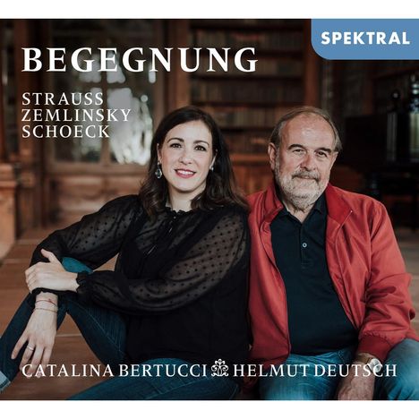 "BEGEGNUNG STRAUSS ZEMLINSKY SCHOECK" oben; "CATALINA BERTUCCI HELMUT DEUTSCH" unten. Mann und Frau nebeneinander sitzend.