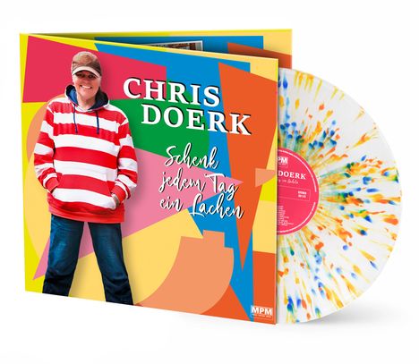 Text: "Chris Doerk. Schenk jedem Tag ein Lachen." Eine Person in rotem Streifenpulli, bunte geometrische Formen, bunte Schallplatte.