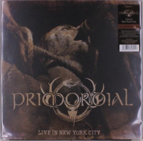 Text: "PRIMORDIAL - LIVE IN NEW YORK CITY". Dunkles Cover mit einer Person beim Singen.