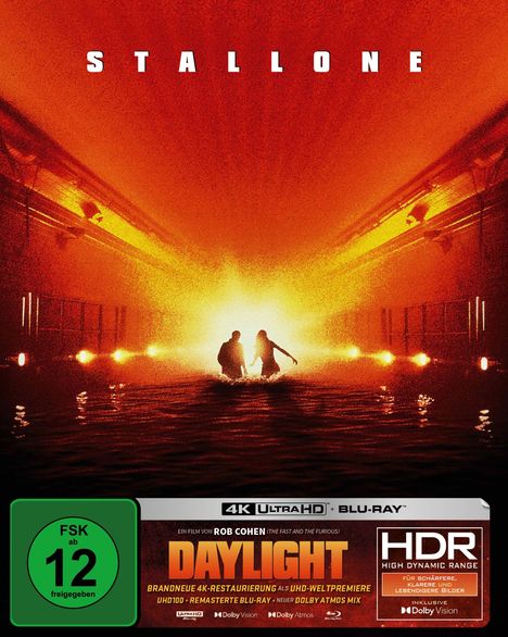 "STALLONE" oben, "DAYLIGHT" unten. Zwei Menschen laufen in einem Tunnel, in orangerotem Licht und Wasser.