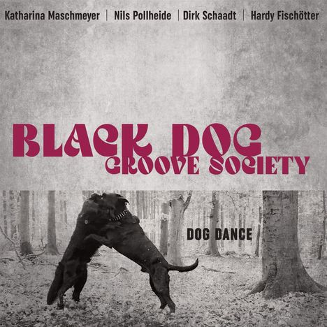 "Black Dog Groove Society" und "Dog Dance" in großer Schrift, zwei Hunde spielen in einem Wald.
