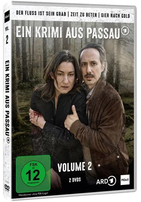 "Ein Krimi aus Passau", "Volume 2". Zwei Personen stehen umarmend in einem düsteren Wald. FSK 12 Logo darunter.