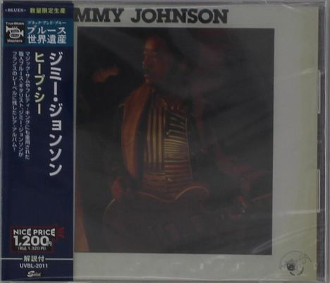 Text oben: "JIMMY JOHNSON". Japanische Schriftzeichen links. Cover zeigt einen Mann mit Gitarre in dunkler Beleuchtung.