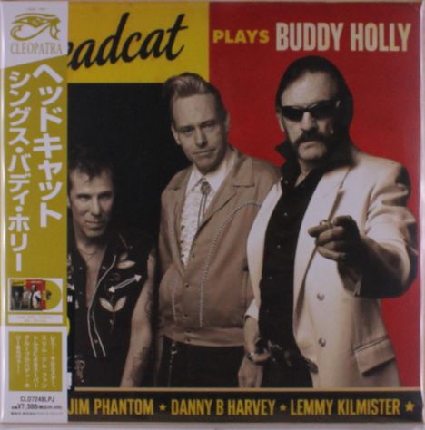Cleopatra-Logo; Headcat spielt Buddy Holly; Jim Phantom, Danny B Harvey, Lemmy Kilmister; drei Männer in Retro-Kleidung.