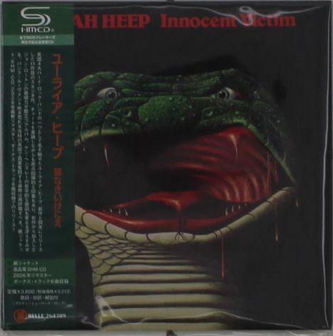 "URIAH HEEP Innocent Victim" in rot oben. Schlangenartiges Gesicht mit weit geöffnetem, roten Maul.