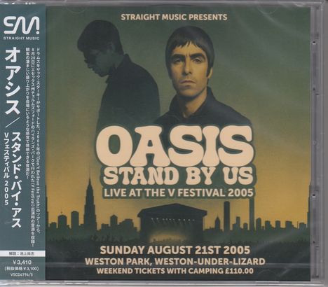 "Oasis Stand By Us Live at the V Festival 2005. Sonntag, 21. August 2005, Weston Park. Silhouetten von Personen und einem Festival."
