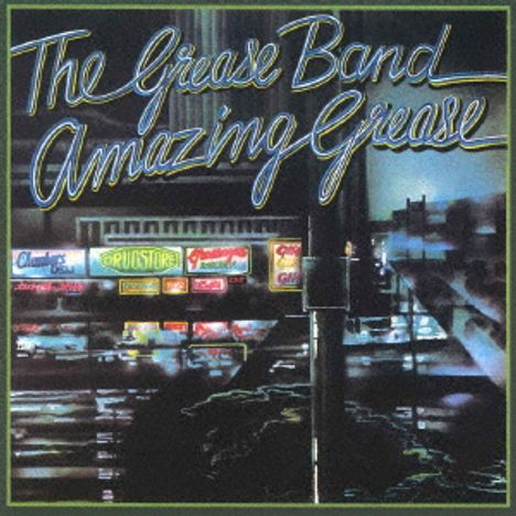 "The Grease Band Amazing Grease" in stilisierter Schrift. Leuchtreklamen vor einem nächtlichen Stadthintergrund.