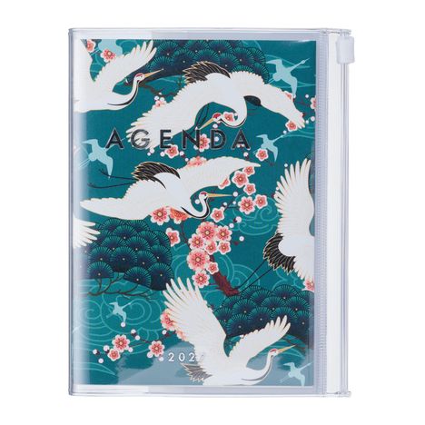 Text: "AGENDA 2021". Illustration von weißen Kranichen und rosa Blüten auf türkisfarbenem Hintergrund.