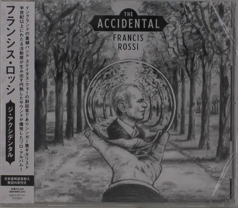 Texte: "THE ACCIDENTAL", "FRANCIS ROSSI". Illustration zeigt Hand, die Glaskugel mit einem Porträt in einer Allee hält.