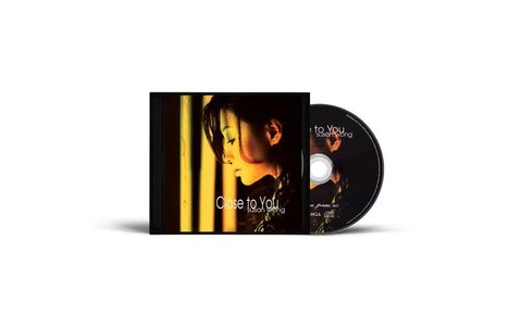 Die Texte lauten "Close to You" und "Susan Wong". Eine CD-Hülle zeigt das Profil einer Frau in warmem Licht.